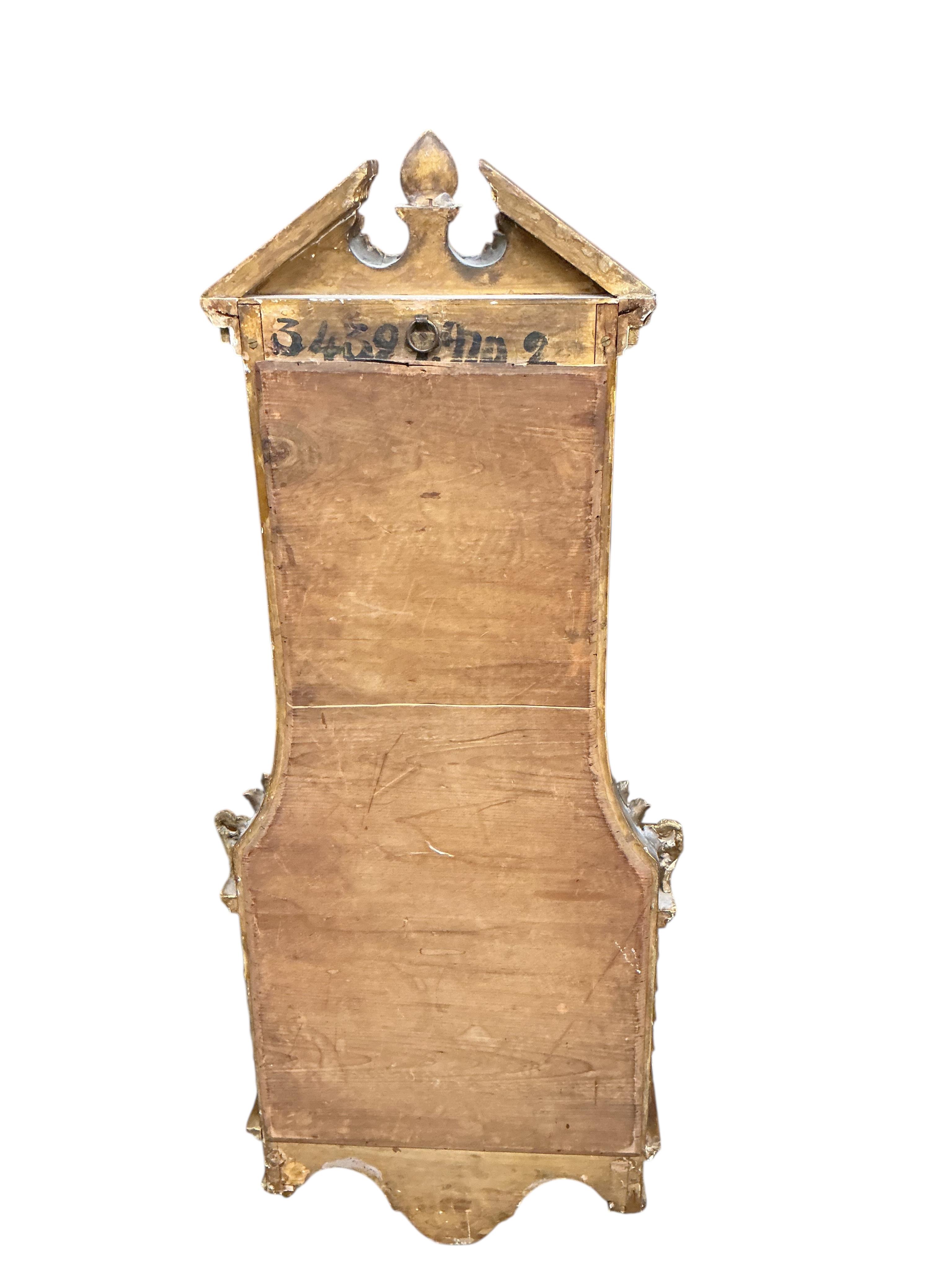 A 19th century giltwood and composition mirrored two tier wall bracket, width 44cm, height 108cm